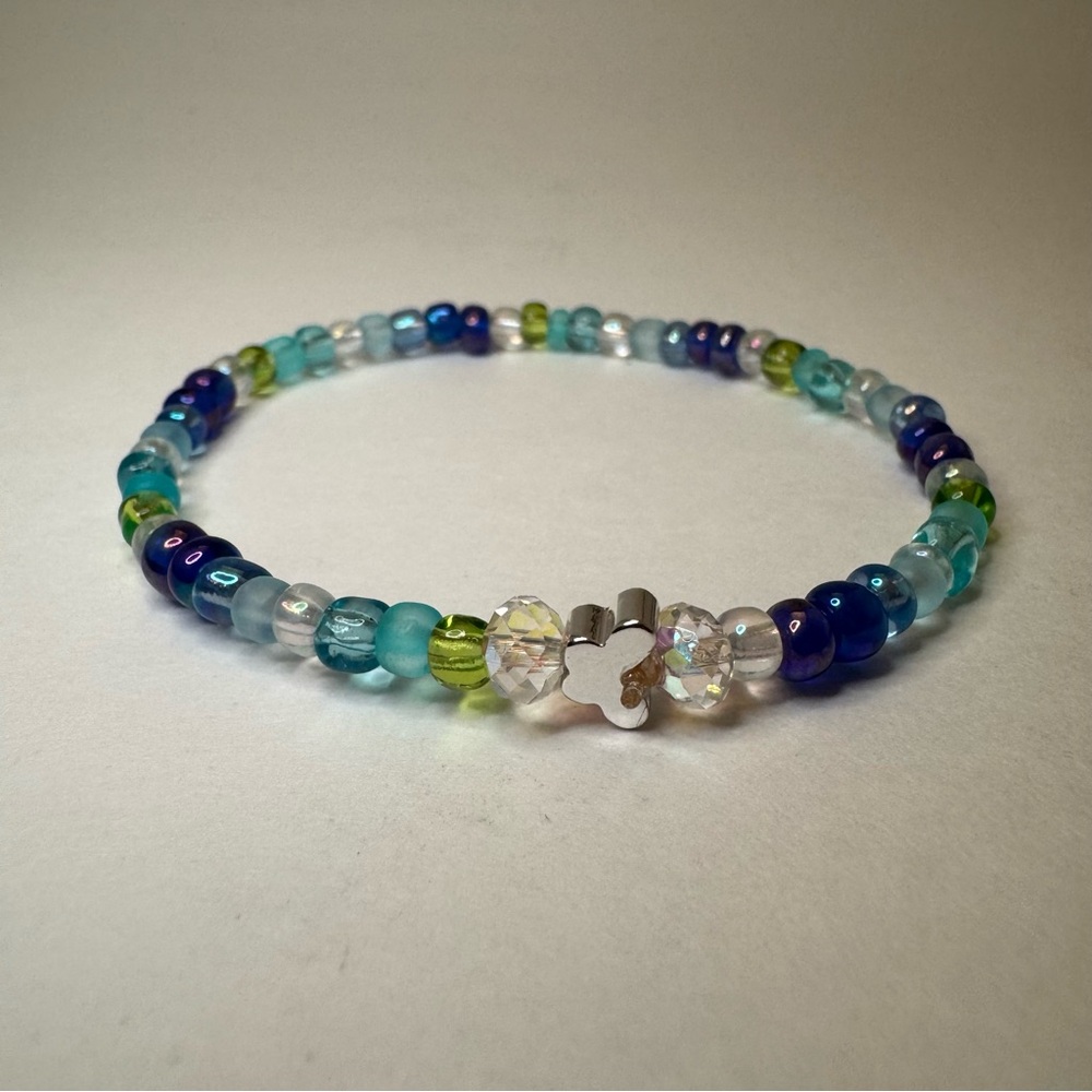 Hand Crafted Blue and Green Oceanic Beaded Bracelet with Silver Butterfly